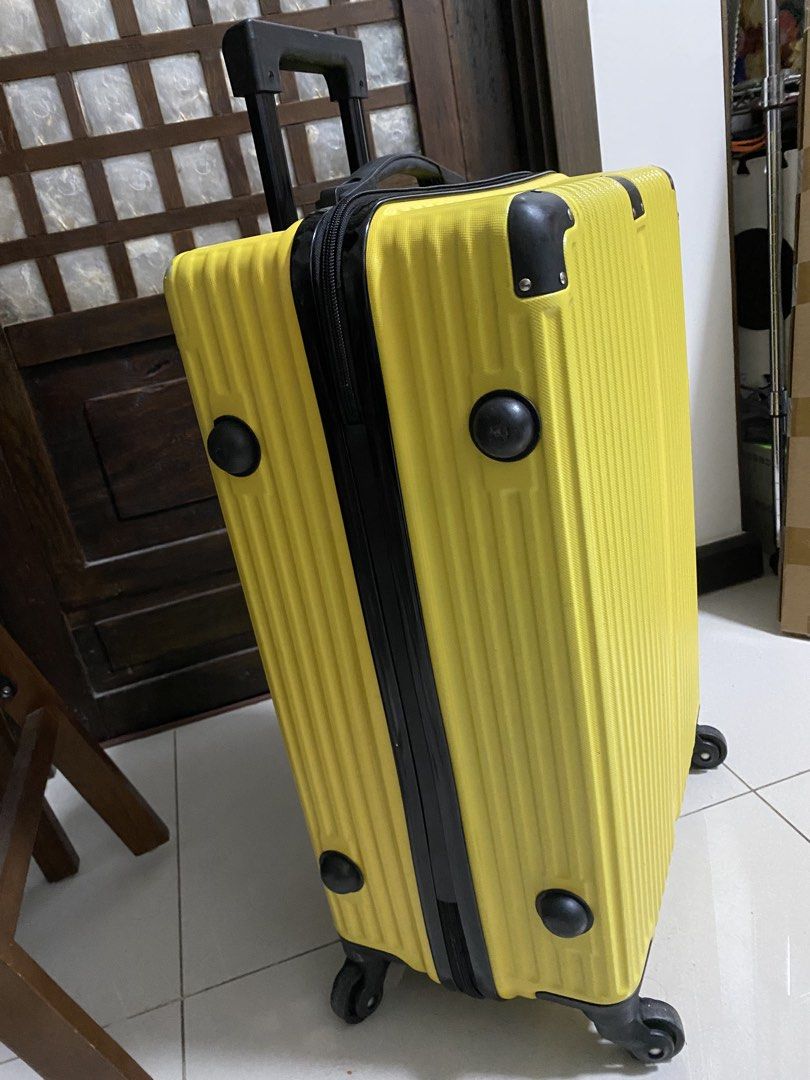 Yellow Hardshell Luggage with Wheels (Category: Luggage) located in Quezon City. Submitted by waytodeclutter (Listing ID 1443491125, Image 2). Description: - Bright yellow hardshell suitcase - Four spinner wheels for easy maneuvering - Retractable handle - Textured ribbed design - Spacious interior for all your travel essentials - Perfect for your next trip!.