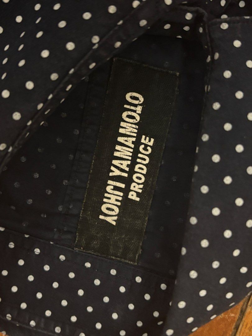Yohji Yamamoto Produce Polka Dot Button Up Longsleeve Shirt (Category: Tshirts & Polo Shirts ) located in Manila. Submitted by mariuswen (Listing ID 1443412356, Image 3). Description: - Yohji Yamamoto Produce polka dot button up longsleeve with waist-cinching feature at the back - RFS: Decluttering - MOP: BPI, GCash - MOD: Lalamove.