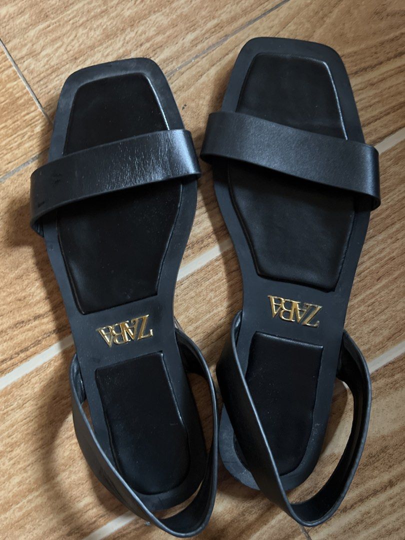Zara black sandals (Category: Flats & Sandals) located in Taguig. Submitted by stuffitlikeitshot (Listing ID 1439573918, Image 2). Description: Orig zara Size 6 Square toe design Ankle strap Visible Zara logo.