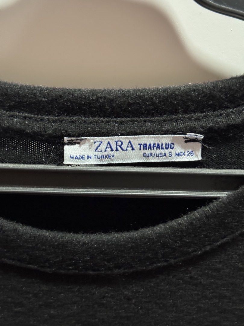 Zara Black T-Shirt with Striped Cuffs (Category: Shirts) located in Makati City. Submitted by _gaby_ (Listing ID 1443379521, Image 3). Description: - Brand: Zara - Color: Black - Sleeves: Short with white and tan striped cuffs - Occasion: Casual wear - RFS: decluttering.