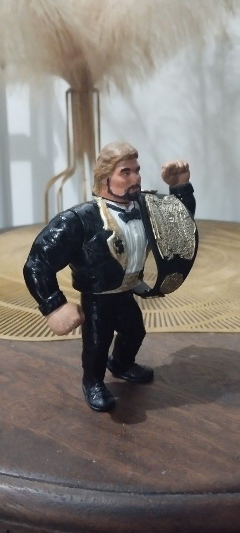 1991 Hasbro WWF Customized Million Dollar Man (Category: Vintage Collectibles) located in Manila. Submitted by ventajetoyz625 (Listing ID 1443605782, Image 2). Description: - Customized paint - Loose left leg - Comes with a championship belt featuring gold accents - Ideal for collectors - "Gimmick" not working - What you see is what you get .