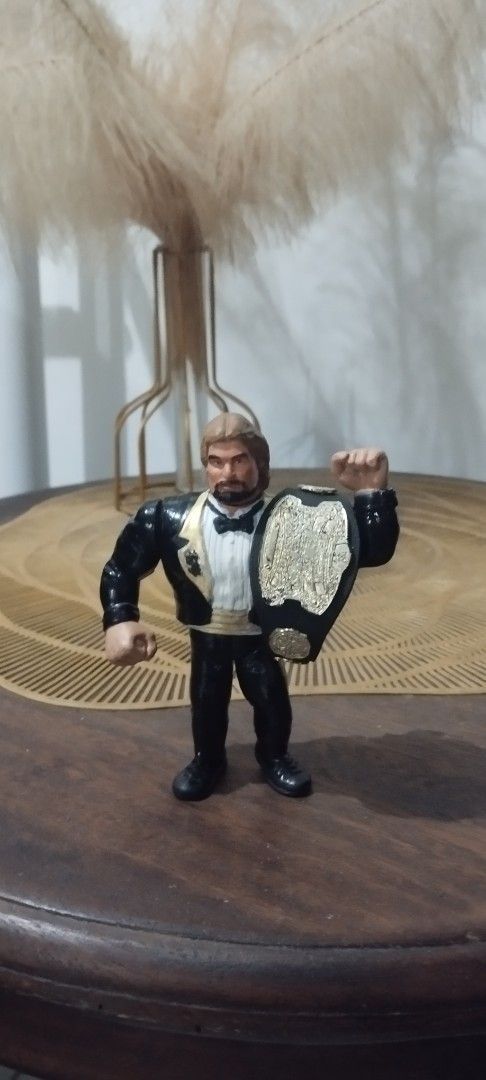 1991 Hasbro WWF Customized Million Dollar Man (Category: Vintage Collectibles) located in Manila. Submitted by ventajetoyz625 (Listing ID 1443605782, Image 1). Description: - Customized paint - Loose left leg - Comes with a championship belt featuring gold accents - Ideal for collectors - "Gimmick" not working - What you see is what you get .