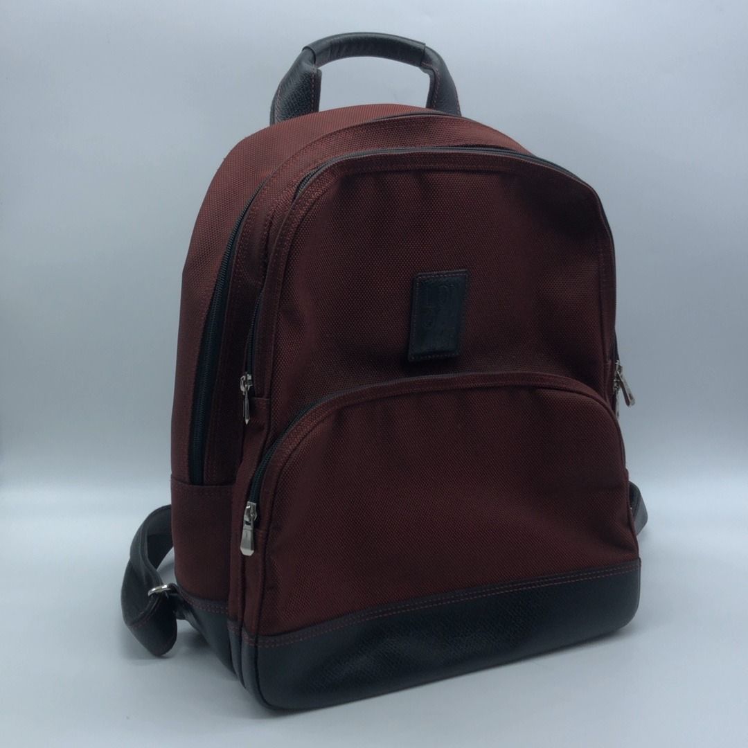267005435 LONGCHAMP BAG CANVAS BOXFORD BACKPACK, (Category: Luxury Bags & Wallets) located in Taguig. Submitted by ecoring.ph (Listing ID 1443570448, Image 1). Description: ◆CONDITION: B ◆DESCRIPTIONS: (Other defects/info:) OUTER: The body of the bag has minimal scratches, scuffs, stains, and dirt, with minor wrinkles and press marks, and shows signs of use. The top handle and backpack straps of the bag are stained, dirty, frayed, and slightly pi