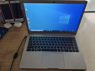 Silver Laptop with Windows 10 and Intel Inside491734521276026880