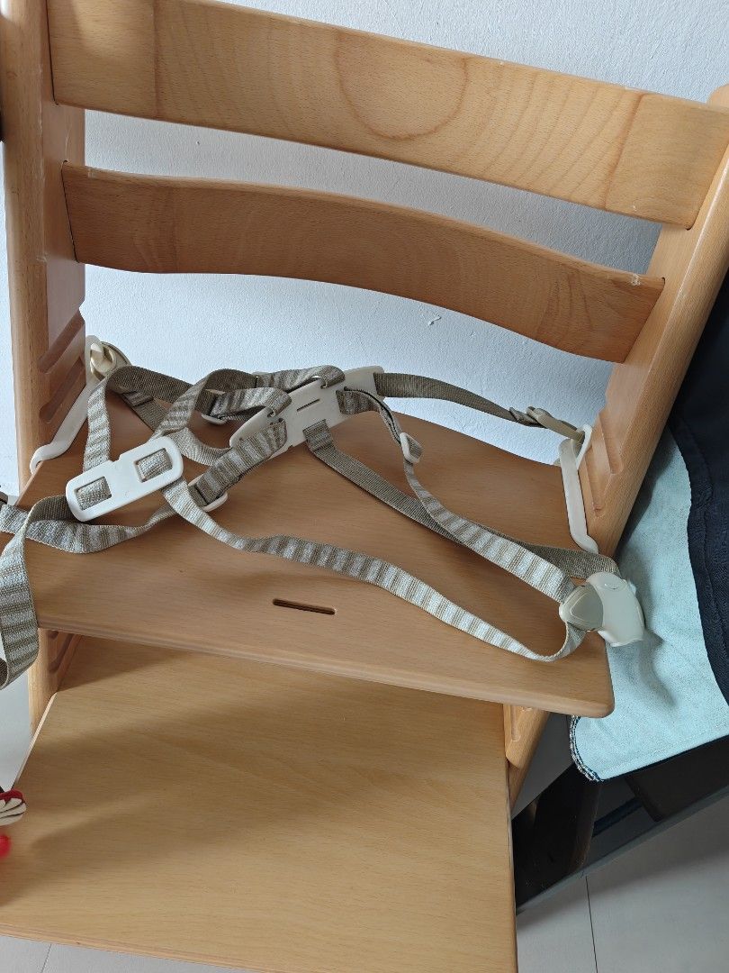 Accessories for Stokke Trip Trapp inspired high chair (Category: Baby High Chairs) located in Singapore. Submitted by junieloon (Listing ID 1443504637, Image 1). Description: - Stokke Tripp Trapp inspired accessories set - Includes: White tray, beige/grey striped harness, bear-print seat cushion - Harness features a secure 5-point buckle - Ideal for keeping your child safe and tidy during meals - High chair NOT included.
