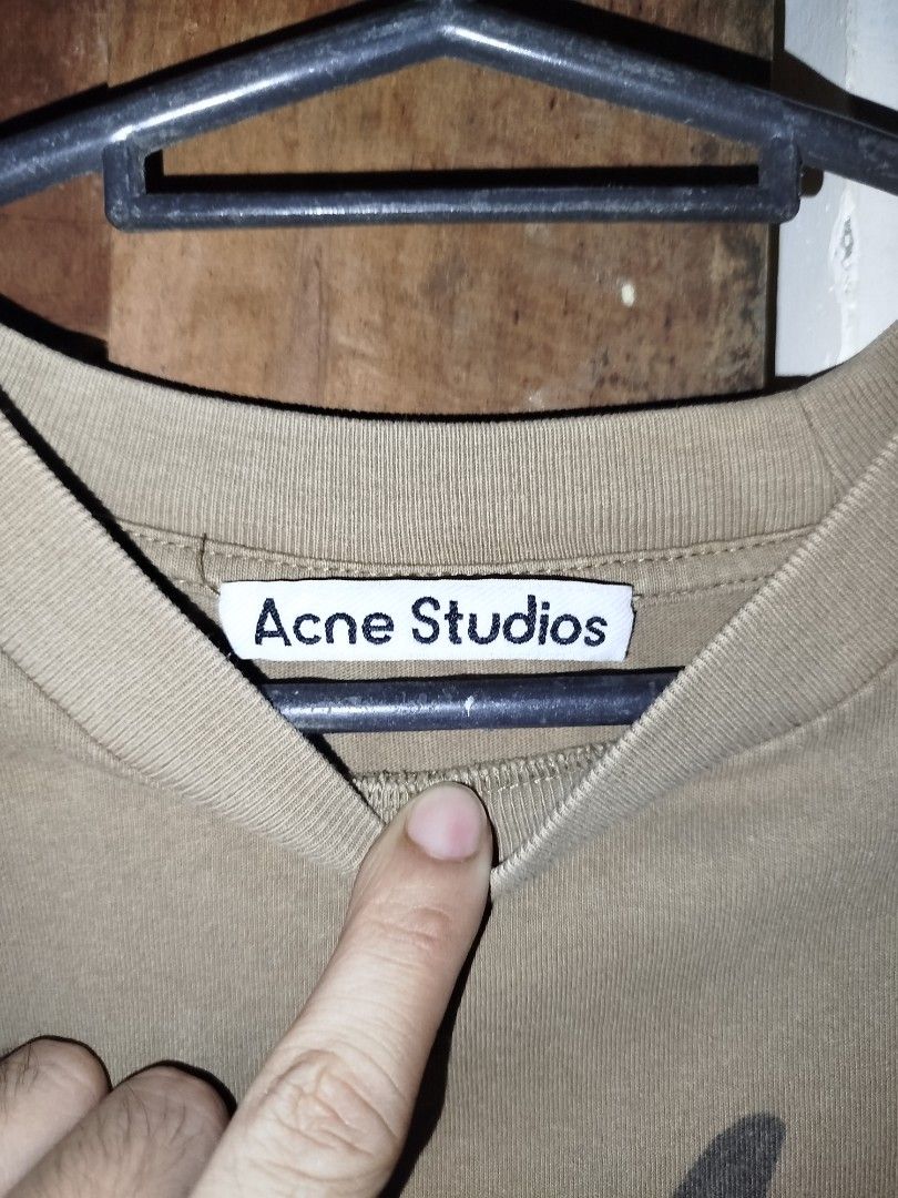 Acne Studios Dolphin Print T-Shirt (Category: Tshirts & Polo Shirts ) located in Marikina City. Submitted by jecccc (Listing ID 1443563188, Image 2). Description: - Acne Studios T-shirt - Cool dolphin graphic design - Color: Tan/Beige - Material: 100% Cotton - Size: S - Ideal for casual wear - Please check photos for detailed condition.