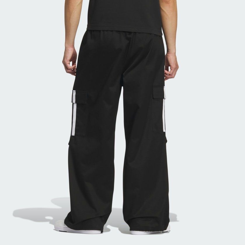 Adidas - 3-Stripe Wide Parachute Pants (Category: Trousers) located in Los Banos. Submitted by declutterking (Listing ID 1443685224, Image 2). Description: Size XL on tag Dimensions: 16.5" waist 14.25" front rise 43" length 12.25" leg opening Good as new condition Authentic.