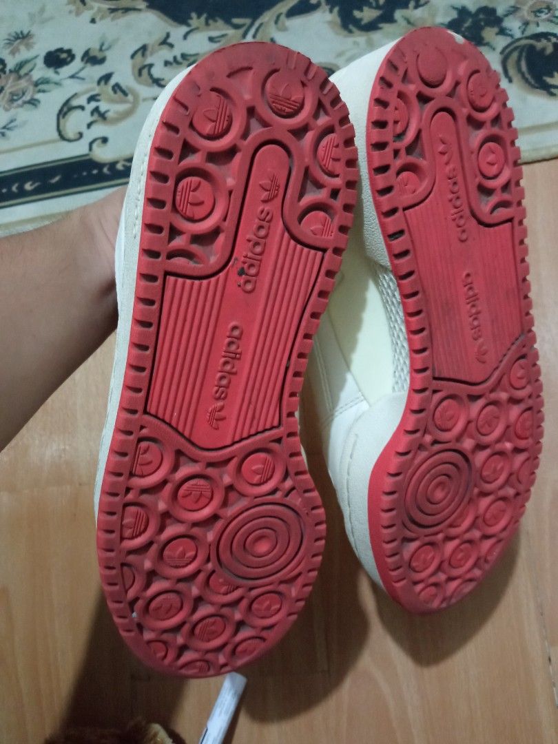 Adidas Parley Sneakers White Red (Category: Sneakers) located in Manila. Submitted by studiozero51579 (Listing ID 1443606494, Image 3). Description: - White Adidas sneakers with striking red accents. - Made in Indonesia. - Size: US 6 / UK 5.5 / FR 38.5. - Features distinctive Parley branding. - Red soles proudly display the Adidas logo. - Ideal for everyday casual wear..