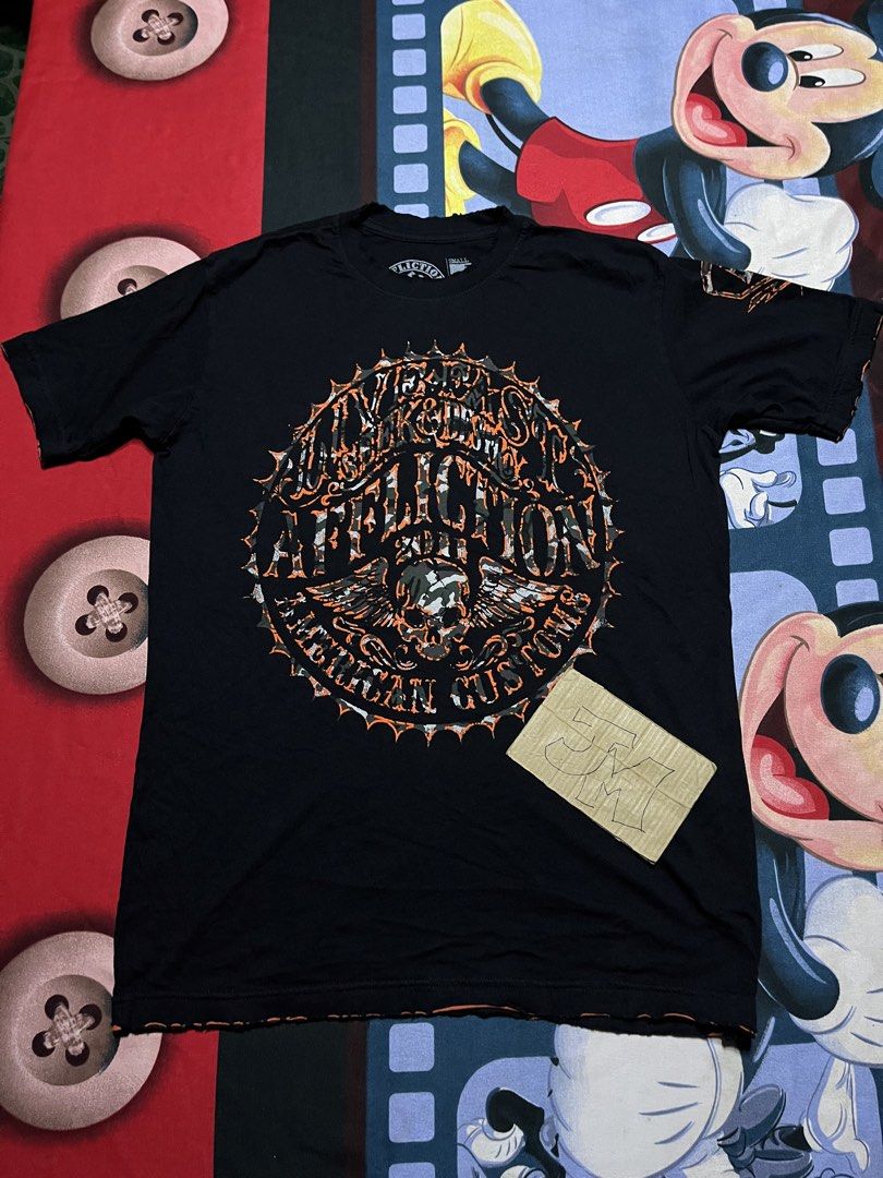 Affliction distress shirt (Category: Activewear) located in Iligan City. Submitted by weepescorner (Listing ID 1443584418, Image 1). Description: Fits Large 21x28.
