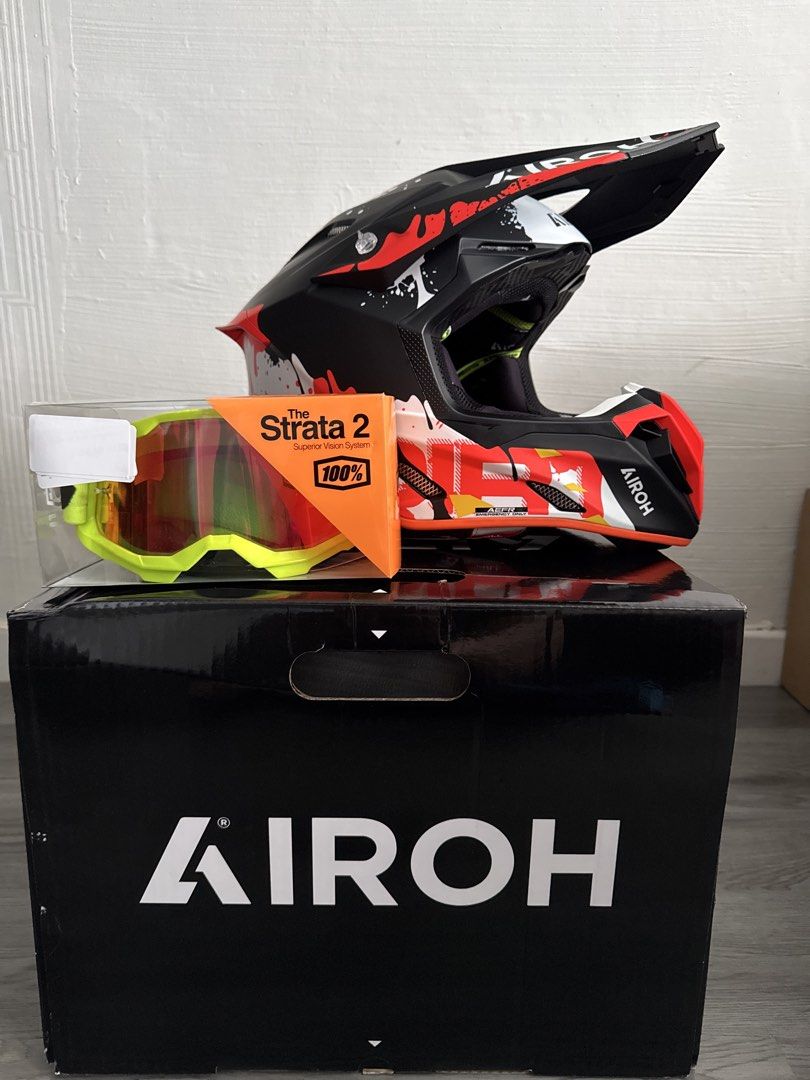 Airoh Motocross Helmet twist 3 with 100% Strata 2 Goggles (Category: Motorcycle Accessories) located in Singapore. Submitted by hellody80s (Listing ID 1443563396, Image 1). Description: Brought it somewhere around mid may 2026 - Airoh motocross helmet size M 57-58 with helmet bag and box. - Cool black, red, and white design - Includes 100% Strata 2 goggles - Goggles feature a bright yellow strap - Goggles have tinted lenses - Both items come in t