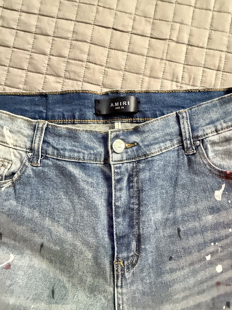 AMIRI Distressed Paint Splatter Jeans Size 34 (Category: Jeans) located in Cainta. Submitted by chagoods (Listing ID 1443630060, Image 2). Description: - Light wash Amiri jeans - Size: 34 Waist, 34 Length - Unique paint splatter details - Distressed areas and ripped knee for an edgy style - Button fly closure - Perfect for a casual, street-style outfit - Please check photos for exact condition.