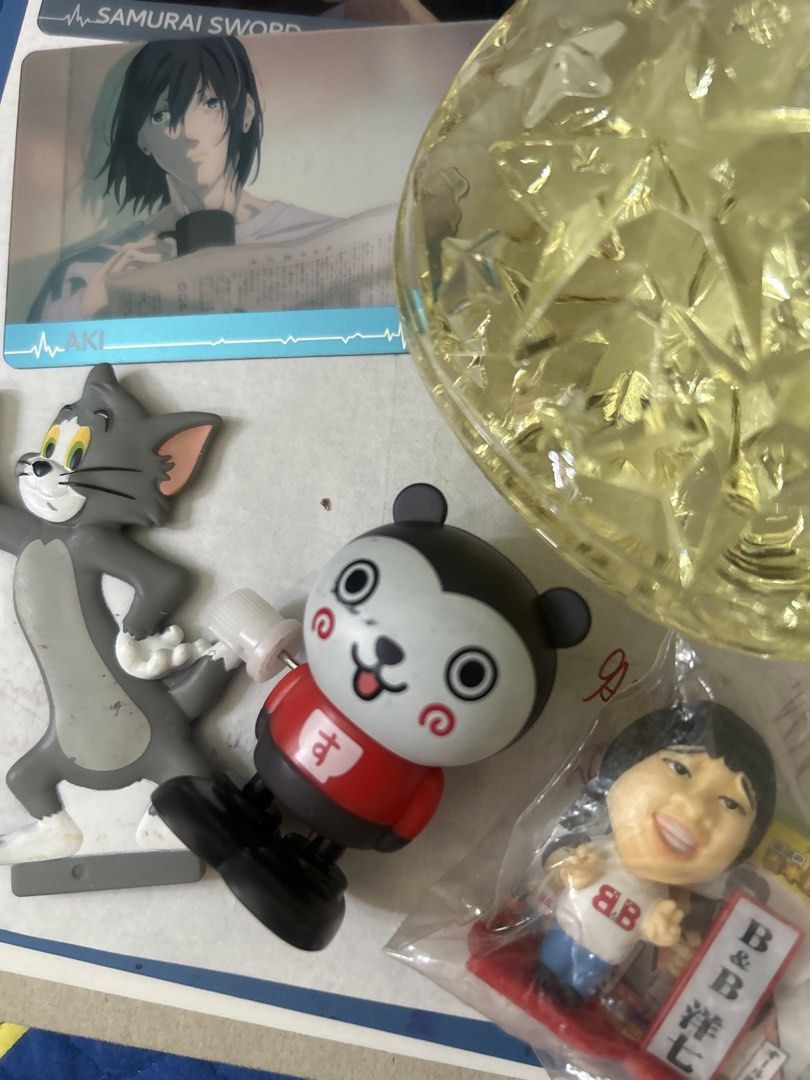 ANIK bundle declutter TAKE ALL ONLY Tom Cat, Aki chainsaw man Card, Moon Decor (Category: Designer & Blind Box Toys) located in Makati City. Submitted by jendavid123 (Listing ID 1443523050, Image 3). Description: Bundle: Tom flat figurine, panda mechanical natakbo toy, Aki samurai chainsawman card, moon decor na may crack sa taas. .