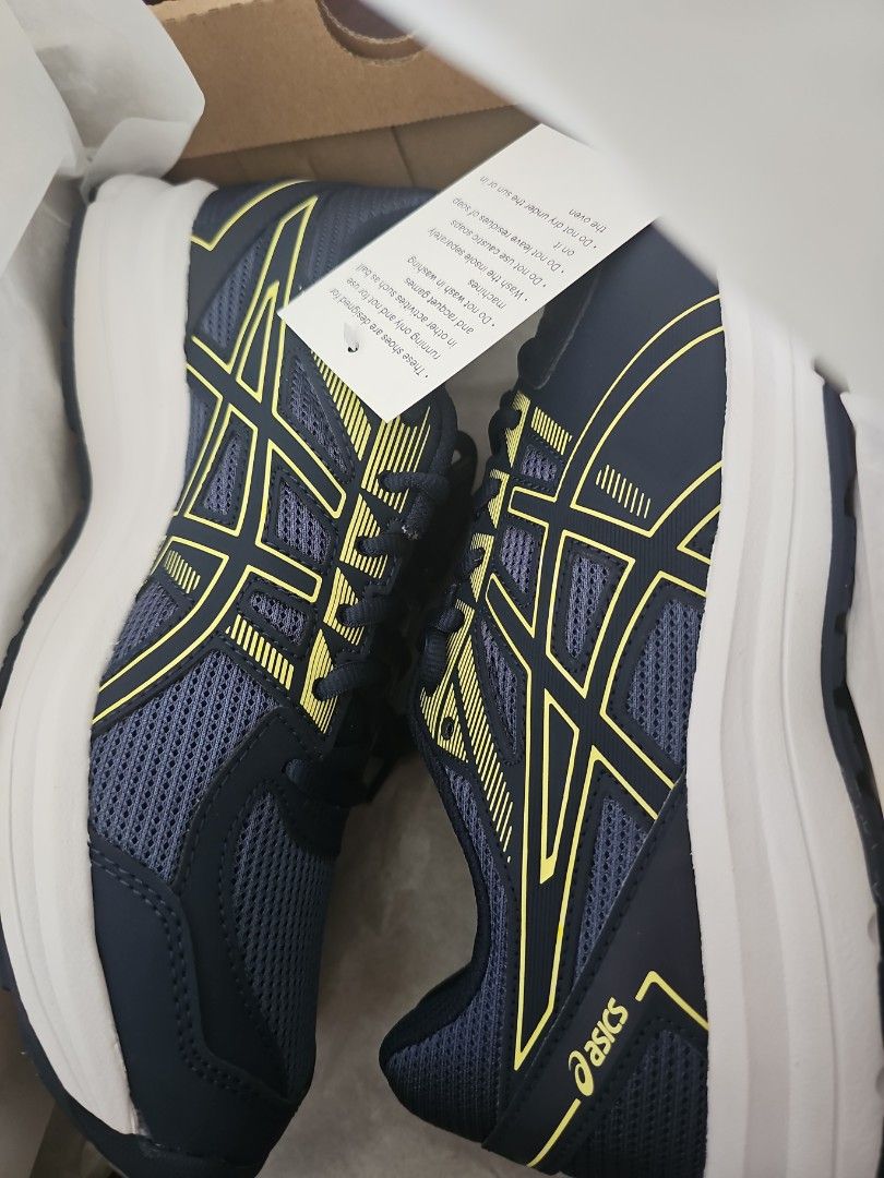 ASICS GEL-JOLT Thunder Blue/Glow Yellow Running Shoes (Category: Sneakers) located in Singapore. Submitted by elephant32 (Listing ID 1443524691, Image 1). Description: - ASICS GEL-JOLT running shoes - Colour: Thunder Blue and Glow Yellow - Size: 2E (Wide fit) - Ideal for running - Comes with original box.