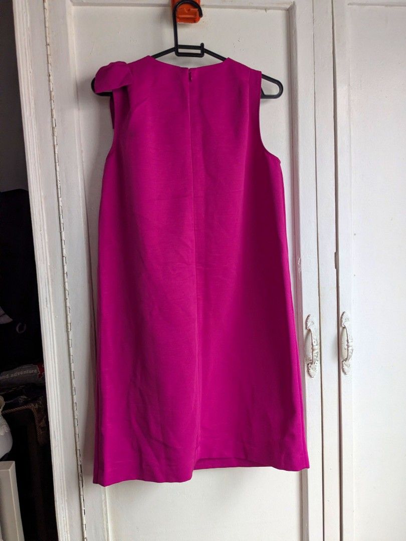 Authentic Ann Taylor Hot Pink Bow Dress (Category: Luxury Apparel) located in Quezon City. Submitted by nnncorner (Listing ID 1443670949, Image 2). Description: Authentic Ann Taylor Hot Pink Bow Doll 100% authentic and bought from USA good as new 139$ original price - 8,000++ in pesos Length - 35 inches Bust - 18 inches (36 inches bustline) Waist - 17 inches (fits 26-34 inches waistline) non stretched fabric double lining perfectly fits for mediu