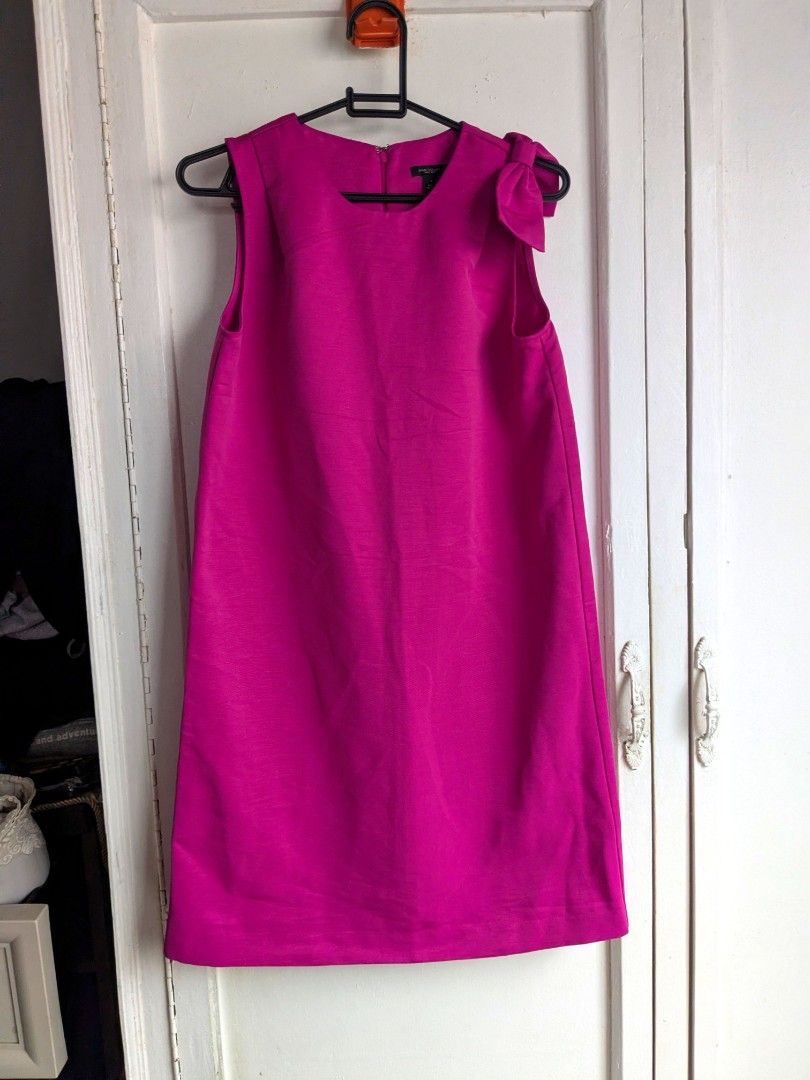 Authentic Ann Taylor Hot Pink Bow Dress (Category: Luxury Apparel) located in Quezon City. Submitted by nnncorner (Listing ID 1443670949, Image 1). Description: Authentic Ann Taylor Hot Pink Bow Doll 100% authentic and bought from USA good as new 139$ original price - 8,000++ in pesos Length - 35 inches Bust - 18 inches (36 inches bustline) Waist - 17 inches (fits 26-34 inches waistline) non stretched fabric double lining perfectly fits for mediu