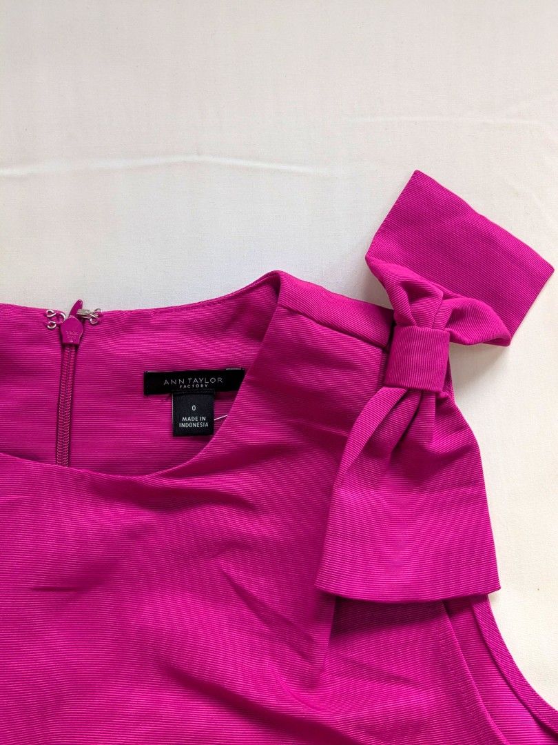 Authentic Ann Taylor Hot Pink Bow Dress (Category: Luxury Apparel) located in Quezon City. Submitted by nnncorner (Listing ID 1443670949, Image 3). Description: Authentic Ann Taylor Hot Pink Bow Doll 100% authentic and bought from USA good as new 139$ original price - 8,000++ in pesos Length - 35 inches Bust - 18 inches (36 inches bustline) Waist - 17 inches (fits 26-34 inches waistline) non stretched fabric double lining perfectly fits for mediu