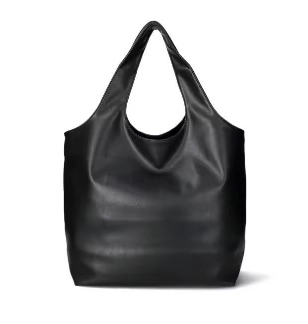 Authentic A.P.C. Ninon Black Leather Tote Bag (Category: Tote Bags) located in Quezon City. Submitted by katharus (Listing ID 1443572661, Image 2). Description: - Brand: A.P.C. - Color: Black - Material: Leather - Design: Simple and spacious - Ideal for: Everyday use or travel - Includes: Original tags and packaging - brand new DESCRIPTION Unisex model. Recycled leather-look material. Two large handles. May be carried by hand or on shoulder. Inte