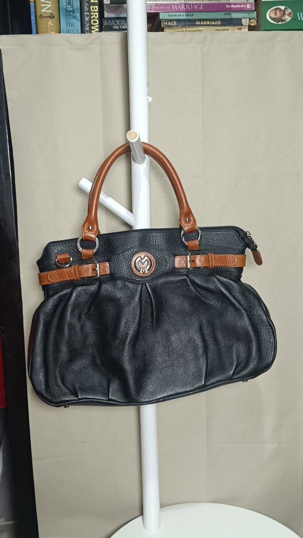 Black Leather Handbag with Brown Straps and Handle (Category: Luxury Bags & Wallets) located in Antipolo. Submitted by secondmusebags (Listing ID 1443663670, Image 3). Description: We sell authentic preloved bags 😊 Condition: Good as new with minimal signs of usage Can send more photos or vids of the bag Price is negotiable for 2 bags and up Tiktok: secondmusebags Location: Upper Antipolo Available for meetup Delivery: Lalamove or J&T Black leat