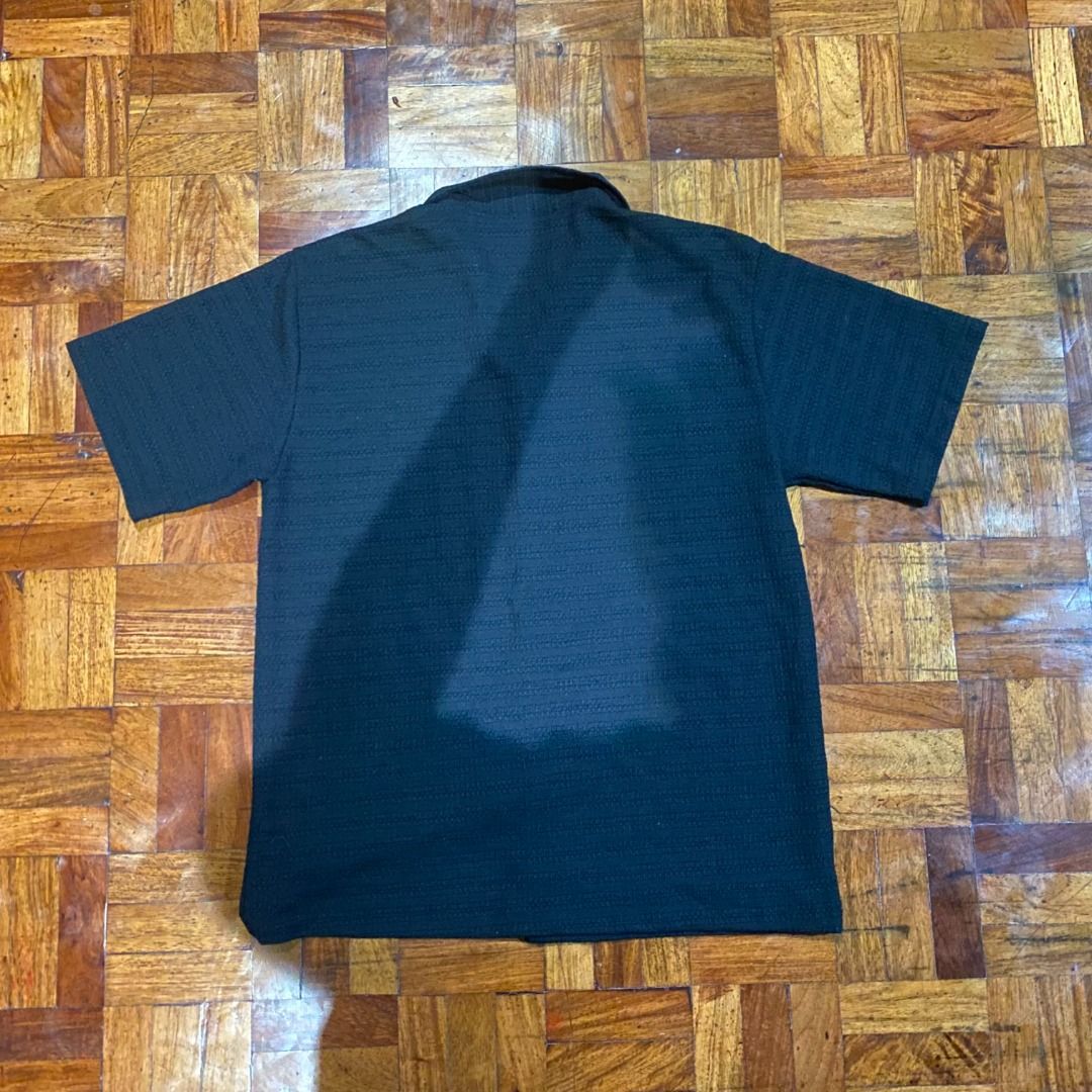 Black Textured Short Sleeve Button-Up Shirt (Category: Tshirts & Polo Shirts ) located in Manila. Submitted by santelmo22 (Listing ID 1443655275, Image 3). Description: Size: Medium Location: Blumentritt Manila.