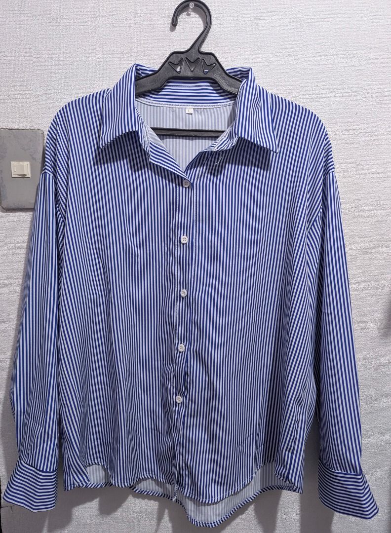 Blue and White Stripes Long Sleeve Polo (Category: Activewear) located in Pasig City. Submitted by igustnik (Listing ID 1443669513, Image 1). Description: NEVER USED WASHED ONLY MEDIUM TO LARGE.