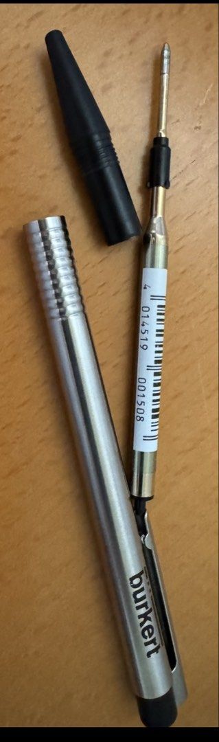 Bürkert-LAMY Ballpoint Pen with Lamy M16 Refill (Category: Stationery & School Supplies) located in Singapore. Submitted by cenedra (Listing ID 1443552636, Image 2). Description: - LAMY Silver metal pen body, black ballpoint - Features 'Bürkert' logo with a black cap - Includes Lamy M16 ballpoint refill (Medium point, marked 'M') - Free postage .