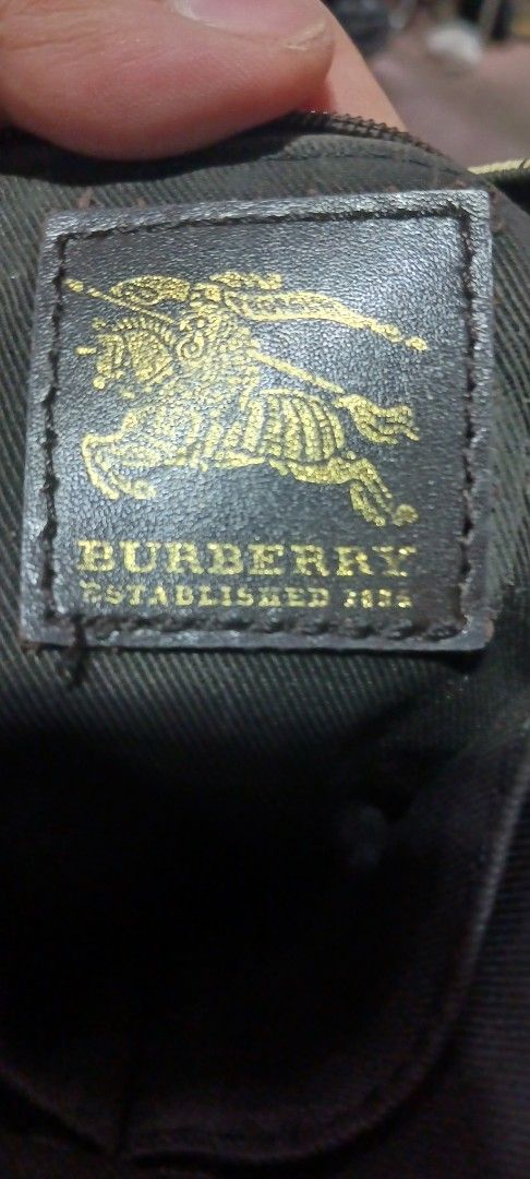 Burberry Nova Check Sling Bag (Category: Luxury Bags & Wallets) located in Koronadal. Submitted by milagraciaukayukay123_. (Listing ID 1443537592, Image 3). Description: - Classic Burberry Nova Check pattern - Genuine leather trim - Adjustable shoulder strap with Burberry logo - Ideal for everyday wear - Guaranteed authentic.