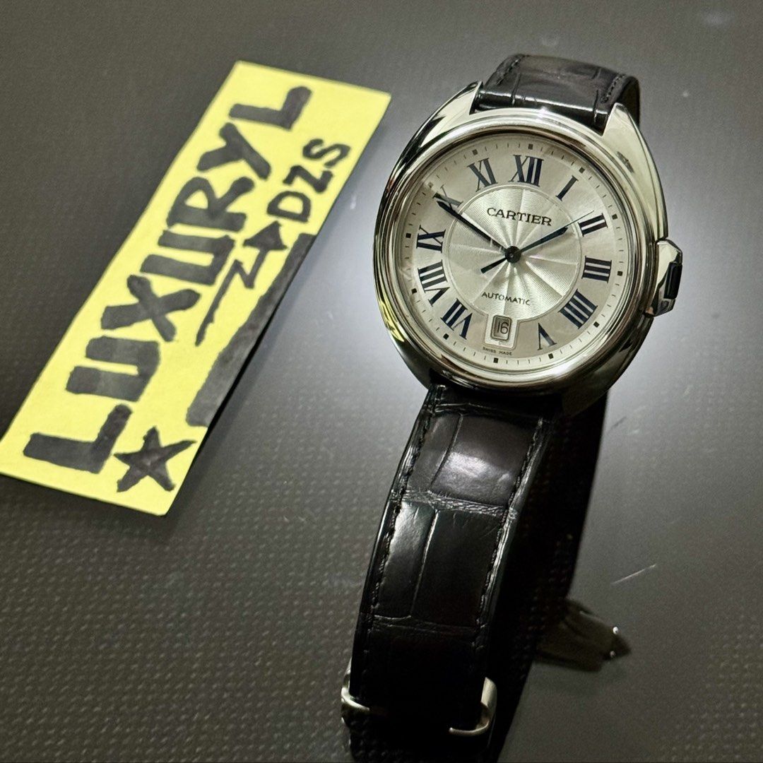 CARTIER Cle De Cartier 40mm (Category: Luxury Watches) located in Dasmarinas. Submitted by luxuryl (Listing ID 1443682163, Image 1). Description: AUTHENTIC Cartier Cle De Cartier 40mm Materials: Stainless Steel Strap: Black Alligator Leather Mechanical: Automatic Ref. Number: WSCL0018 (PRELOVED) Condition: 9.5/10 Unit Only❗️ NEGOTIABLE❗️📩 Open for meet up or shipping ❗️ Moneyback guarantee if proven fake❗️💯✅ You can check everything you want. A