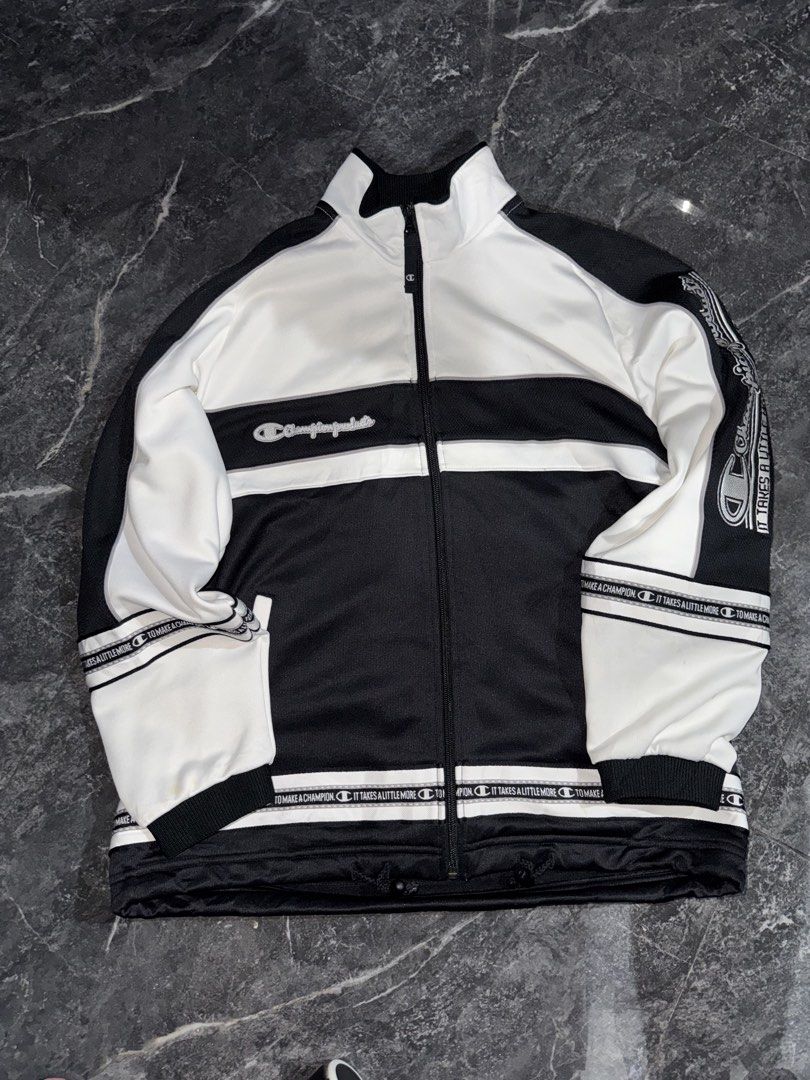 Champion Products Track Jacket ( Black & White ) (Category: Coats, Jackets and Outerwear) located in Manila. Submitted by _kjuncottoon (Listing ID 1443610220, Image 1). Description: Size: S (JASPO) Colorway: Black/White Full-zip track jacket with embroidered Champion Products logo, branded sleeve tape, and Champion zipper pull..