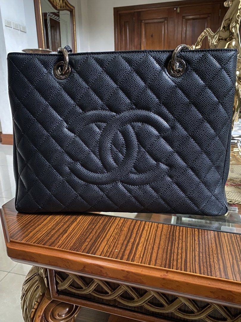 Chanel GST Black Caviar in silver hardware (price is negotiable) (Category: Luxury Bags & Wallets) located in Taguig. Submitted by thetreasuredpieces (Listing ID 1443679028, Image 1). Description: Chanel GST Black Caviar Leather, SHW Series 16 Personal collection. First owner Very good condition (97%) - Caviar leather grain is still well-defined and not flattened - Quilting still looks puffy - Structure of the bag is still upright and not collaps