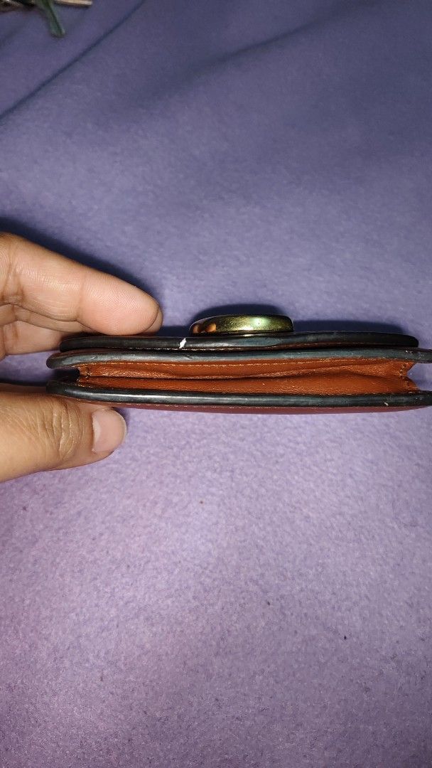 Chloe Brown Leather Wallet with Gold C Logo (Category: Luxury Bags & Wallets) located in Angeles City. Submitted by miyaliwa.tapandshop (Listing ID 1443510702, Image 2). Description: - Authentic Chloe brown leather wallet - Iconic gold C logo on the front - Compact and perfect for essentials - Secure snap closure - Features Chloe branding inside free shipping until July 30.