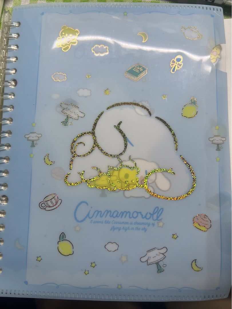 Cinnamoroll Binder Notebook (Category: Stationery & School Supplies) located in Quezon City. Submitted by ella.cstn (Listing ID 1441814424, Image 1). Description: Rfs: I have too many notebooks na - With Sanrio license - I only used around 4 pages (natanggal ko na sya) - Good as new - Comes with clear pocket (I added free stickers as seen in the photo!) - Mabilis linisin ung cover kahit wipes lang - Has cute cinnamoroll designed dividers - The pe