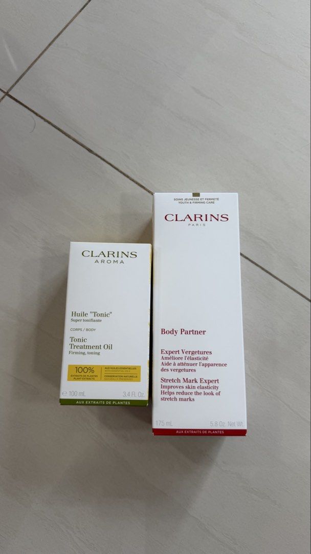 Clarins Tonic Treatment Oil & Body Partner Stretch Mark Expert (Category: Face Care) located in Singapore. Submitted by peixing15 (Listing ID 1443570710, Image 1). Description: - Clarins Tonic Treatment Oil (100ml) - Clarins Body Partner Stretch Mark Expert (175ml) .
