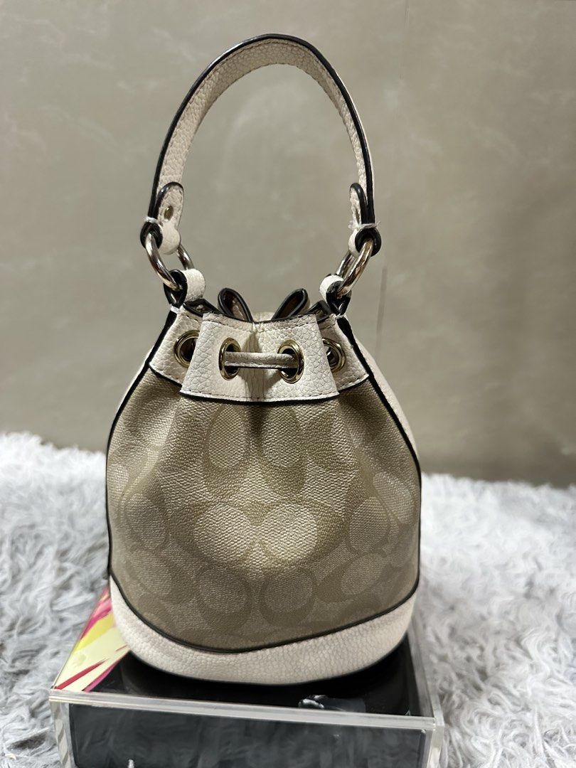 Coach Dempsey DS Bucket Bag (Category: Luxury Bags & Wallets) located in Davao. Submitted by vintagefashionwear (Listing ID 1443636033, Image 3). Description: .