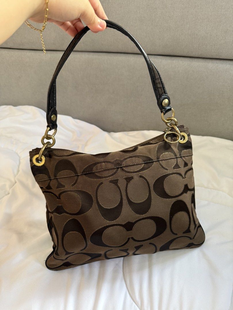 Coach Poppy Choco Brown Hobo Bag (Category: Luxury Bags & Wallets) located in Calasiao. Submitted by nicnaks_collection (Listing ID 1443621766, Image 3). Description: 𐙚 ‧₊˚ ⋅ Cch Poppy Metallic Choco Brown ♡⸝⸝ All items are guaranteed authentic. ⟢ Normal signs of usage ⟢ crack creed front and inside ⟢ Gold hardware tarnish ⟢ stiff strap Kindly read our shop rules. Strictly no cancellation, exchange, return/refund of items. Make sure to double ch