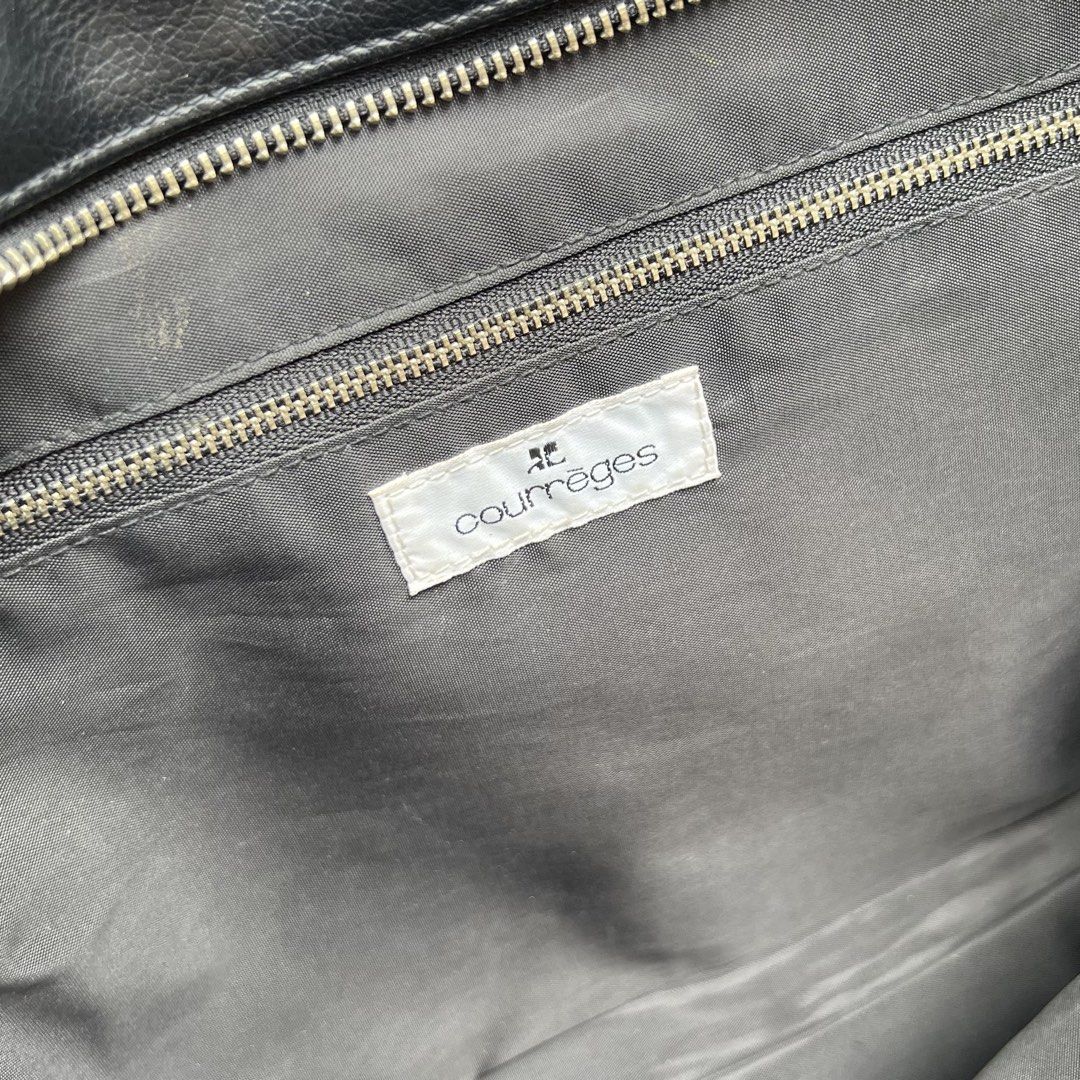 Courreges Black Shoulder Bag (Category: Shoulder Bags) located in Bulacan. Submitted by beesquit (Listing ID 1443570585, Image 3). Description: Decluttering : Courrèges Shoulder Bag • Material: Premium Synthetic Leather & Glossy Leather Strap • Spacious interior with secure zip closure •Ideal for everyday use or professional settings • See photos for dimensions & flaws MOP: GCash or BDO Shipping: JnT or Lalamove Make offer for serious buyers..