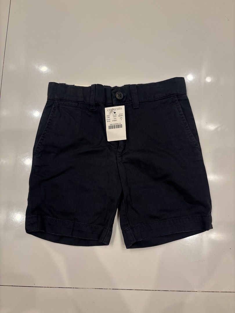 Crewcuts Navy Chino Shorts Size 4 (Category: Babies & Kids Fashion) located in Quezon City. Submitted by branded.ktk (Listing ID 1443596573, Image 1). Description: LENGTH - 30CM WAIST - 26CM (adjustable) - Navy blue chino shorts from Crewcuts - Size 4 - Adjustable waist inside for a perfect fit - Secure button and zip closure - Two front pockets and two back pockets - Ideal for everyday wear.