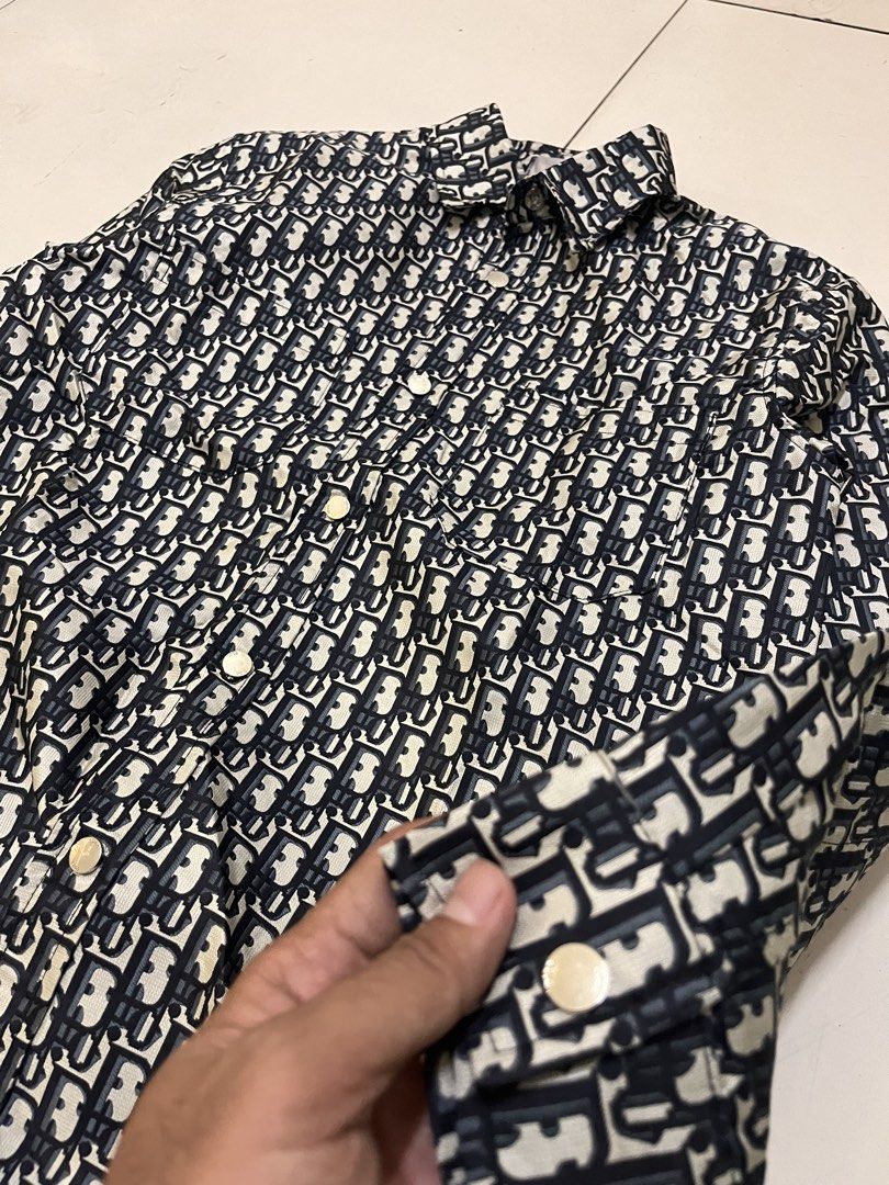 DIOR MONOGRAM POLO SLEEVE (Category: Luxury Apparel) located in Manila. Submitted by bibiiii131998 (Listing ID 1443648381, Image 1). Description: Details W20 L28 Small Loc.Baclaran.