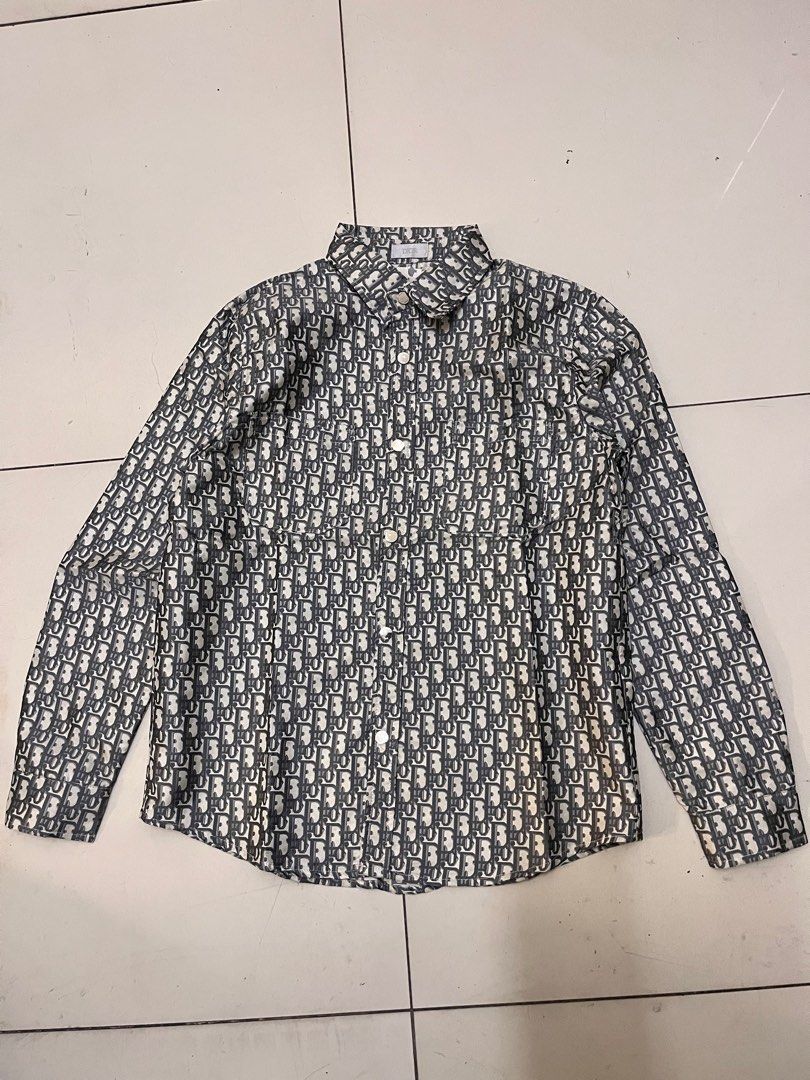 DIOR MONOGRAM POLO SLEEVE (Category: Luxury Apparel) located in Manila. Submitted by bibiiii131998 (Listing ID 1443648644, Image 1). Description: Details W21 L29 Medium Loc.Baclaran.