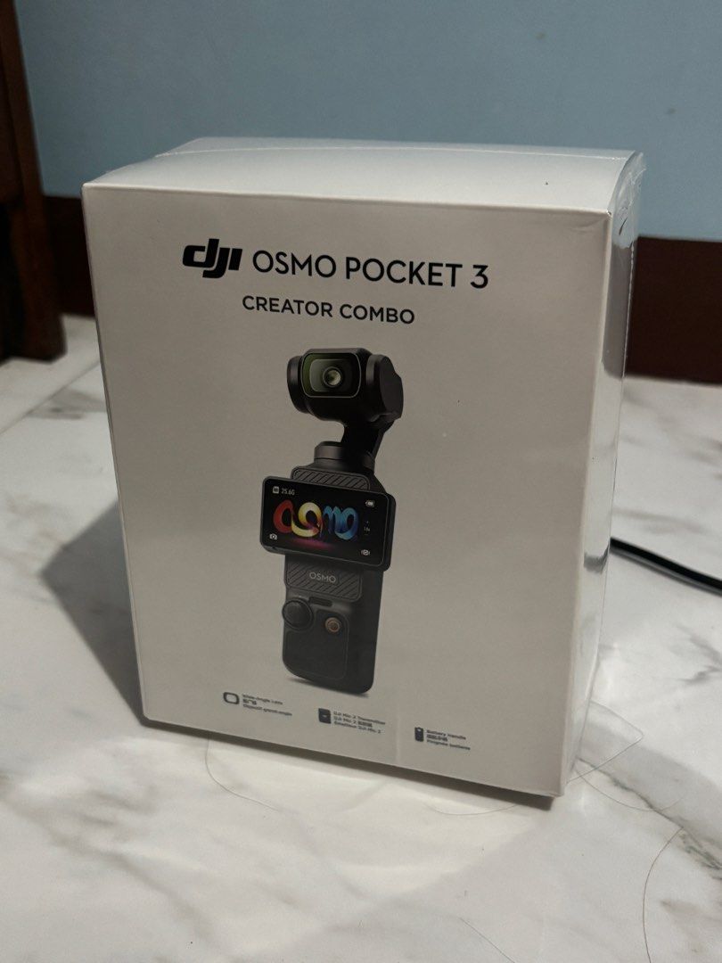 DJI Osmo Pocket 3 (Category: Video Cameras) located in Manila. Submitted by warmshark.92e827 (Listing ID 1443691861, Image 1). Description: For Sale!!! DJI Osmo Pocket 3 Creator Combo Brand new sealed Complete items inside W/ limited warranty - DJI Osmo Pocket 3 Creator Combo for professional-quality video. - Includes Osmo Pocket 3 camera for stabilized footage. - Wide-angle lens expands your creative possibilities. - DJI Mic 2 for crystal-clear 