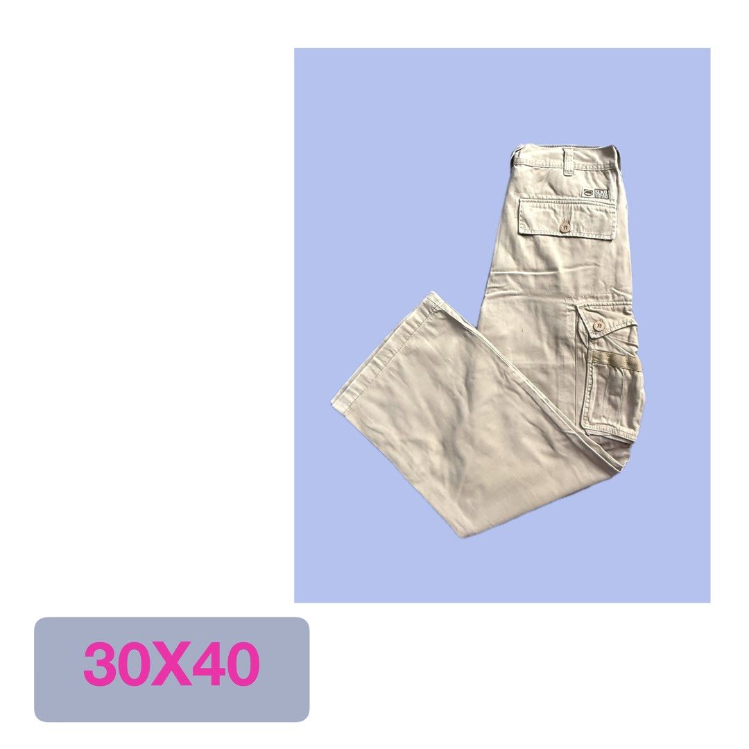 Ecko Unltd. Cargo Pants Size 16 Tan Cotton (Category: Jeans) located in Cainta. Submitted by chagoods (Listing ID 1443629800, Image 1). Description: - Brand: Ecko Unltd. - Type: Cargo Pants - Color: Tan - Size: 16 - Material: 100% Cotton - Features: Classic cargo design with multiple pockets, inner lining with Ecko print. - Style: Great for casual wear..