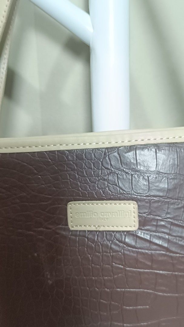 Emilio Cavallini Brown Croc Embossed Tote Bag (Category: Luxury Bags & Wallets) located in Antipolo. Submitted by secondmusebags (Listing ID 1443663660, Image 2). Description: We sell authentic preloved bags 😊 Condition: Good as new with minimal signs of usage Can send more photos or vids of the bag Price is negotiable for 2 bags and up Tiktok: secondmusebags Location: Upper Antipolo Available for meetup Delivery: Lalamove or J&T - Elegant brown