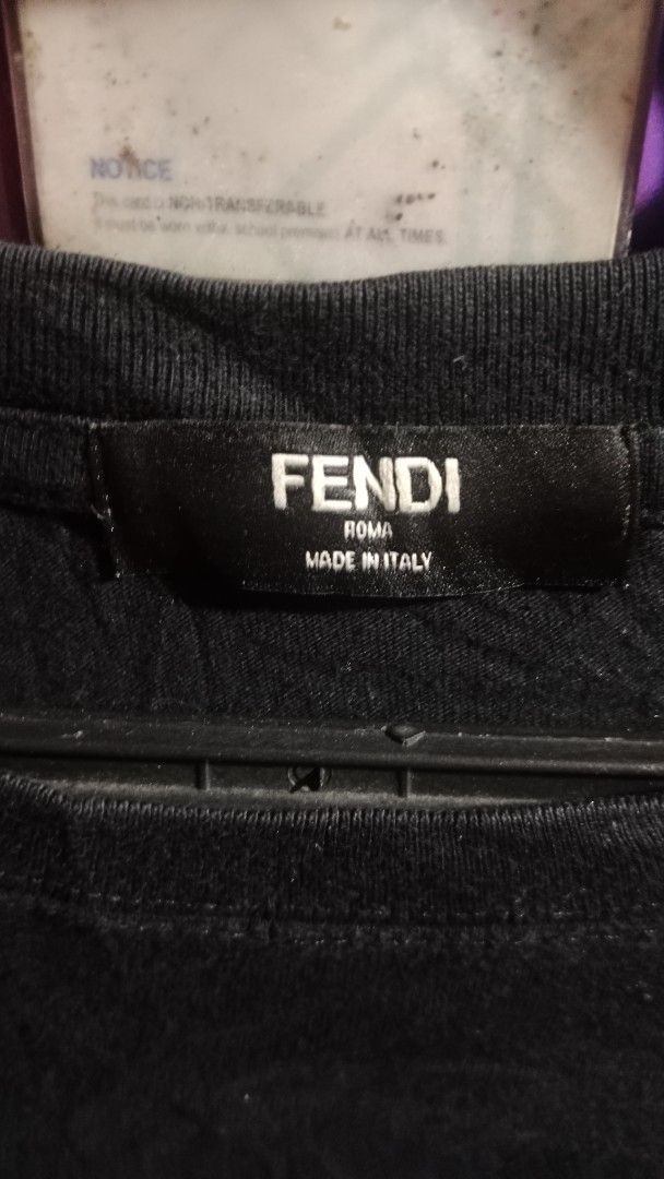 Fendi Roma T-Shirt (Category: Tshirts & Polo Shirts ) located in Manila. Submitted by thrift_on_the_street (Listing ID 1443613808, Image 2). Description: - Authentic Black Fendi T-shirt - Iconic FF motif and 'Roma' detail - Made in Italy - Size: Large (L) - Ideal for casual wear.