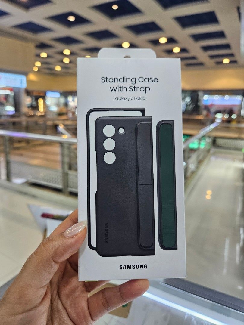 Fold 5 Standing Case with Strap (Category: Cases & Sleeves) located in San Juan City. Submitted by rjean02 (Listing ID 1443596972, Image 1). Description: 1000 beige 1100 black original Brandnew location Theatermall Greenhills.