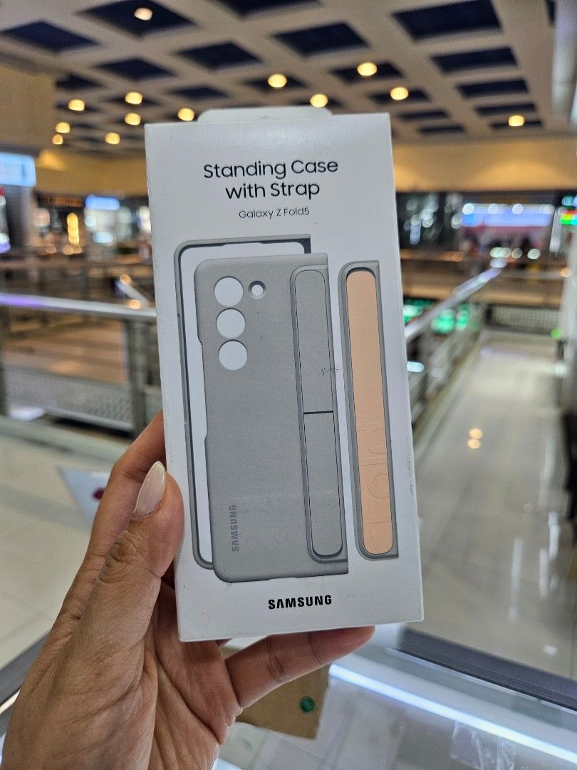 Fold 5 Standing Case with Strap (Category: Cases & Sleeves) located in San Juan City. Submitted by rjean02 (Listing ID 1443596972, Image 2). Description: 1000 beige 1100 black original Brandnew location Theatermall Greenhills.