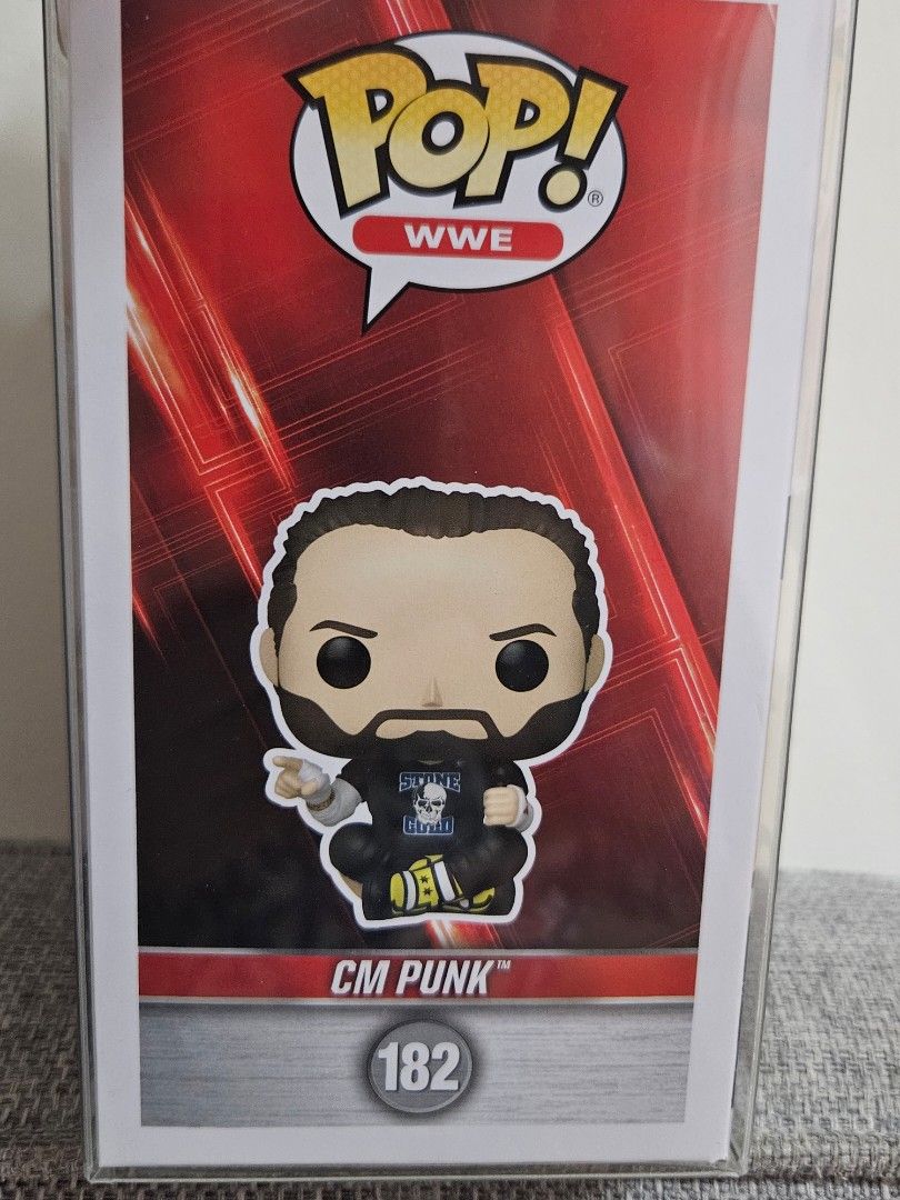 Funko CM Punk pipe bomb (Category: Designer & Blind Box Toys) located in Mandaluyong City. Submitted by reyerayo (Listing ID 1443540345, Image 2). Description: - Funko Pop WWE CM Punk figure - Model #182 - Figure still in original plastic protector prestine condition hard to find pipe bomb version shipping c/o buyer manda area ako.
