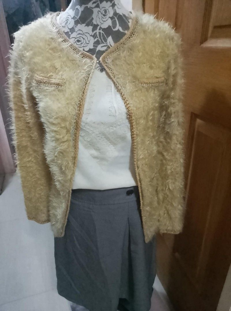 Fuzzy Textured Cropped Cardigan with Embellished Pockets (Category: Coats, Jackets and Outerwear) located in Manila. Submitted by sakinto (Listing ID 1443607216, Image 2). Description: - Creamy beige fuzzy cropped cardigan - Open front design - Two small chest pockets with beaded trim - Braided trim detail on edges - Cozy and stylish, ideal for layering inner attire and bag not included message details first.