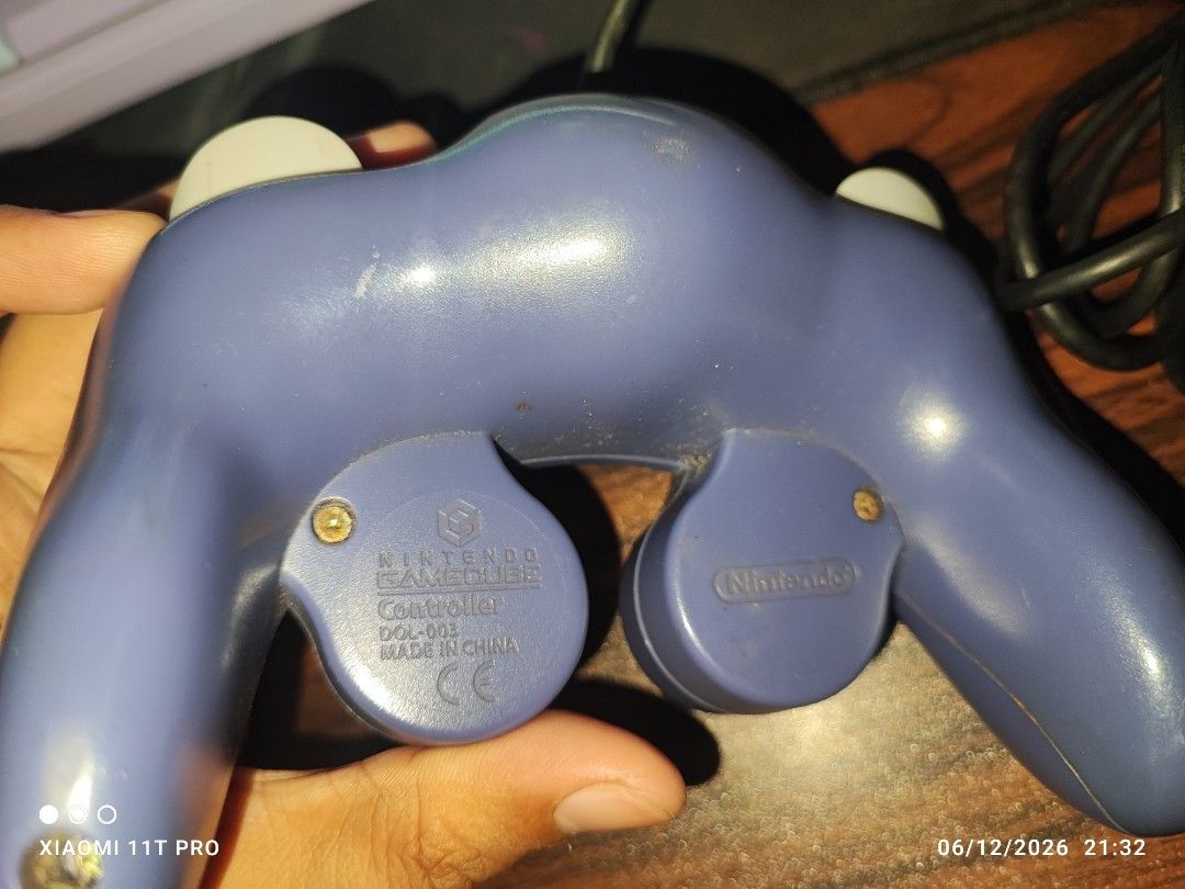 GameCube Controller Original Purple DOL-003 (Category: Controllers) located in Manila. Submitted by pcltasenseigaming (Listing ID 1443507993, Image 3). Description: GameCube Controller Original Purple DOL-003 📌 Price 749 📌 Negotiable 📌 Details : May Kalawang sa Port ng controller at yung joystick kita naman sa picture pero working tested, bawal sa maselan 📌 2nd Hand Tested Working 📌 Can Send Pictures/Video Of Item With Time & Date 📌 Compati