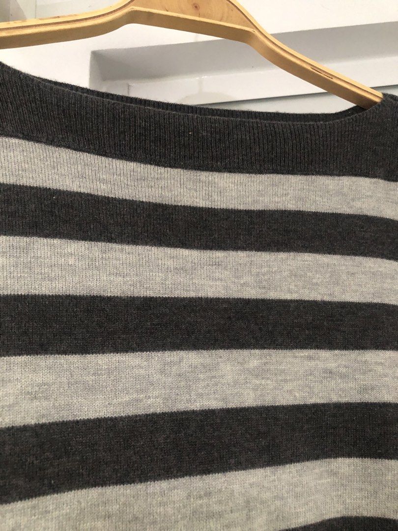Gap Striped Boat Neck Long Sleeve Sweater (Category: Longsleeves) located in Manila. Submitted by rshay (Listing ID 1443524187, Image 2). Description: - Grey and light grey striped sweater - Boat neck style with long sleeves - Made of soft knit material - Versatile for layering or wearing solo - Easy to pair with jeans or skirts - Comfortable and casual - Oversized; can fit up to large.