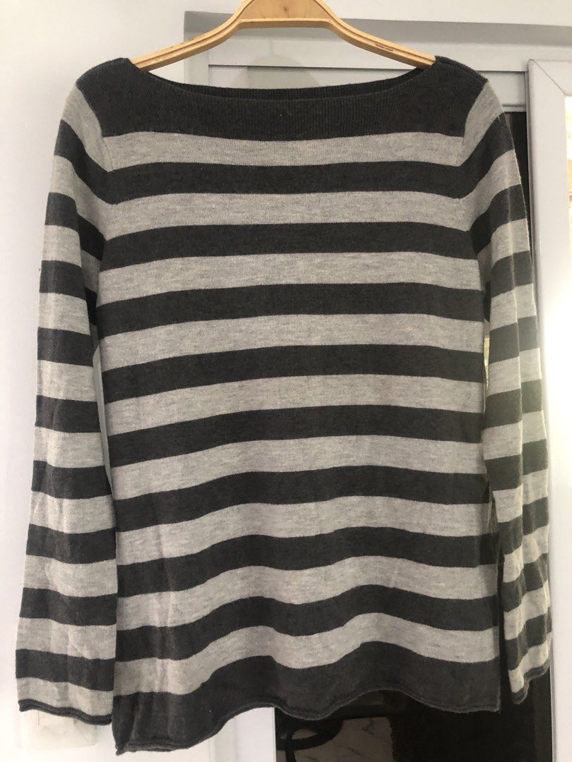 Gap Striped Boat Neck Long Sleeve Sweater (Category: Longsleeves) located in Manila. Submitted by rshay (Listing ID 1443524187, Image 1). Description: - Grey and light grey striped sweater - Boat neck style with long sleeves - Made of soft knit material - Versatile for layering or wearing solo - Easy to pair with jeans or skirts - Comfortable and casual - Oversized; can fit up to large.