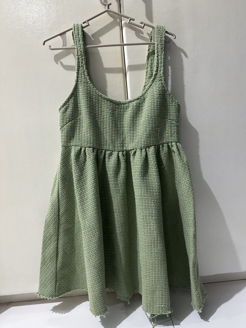 Green Textured Mini Dress with Raw Hem (Category: Dresses) located in Manila. Submitted by loved_ag (Listing ID 1443527915, Image 1). Description: - Adorable green mini dress - Textured fabric all over - Flattering square neckline with tank straps - Elasticated waist for a comfortable fit - Flowy flared skirt - Trendy raw hem detail - Versatile for casual outings or dressing up.